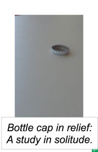 BOTTLE CAP IN RELIEF